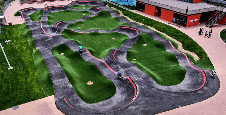 Builder of cement or asphalt pumptrack