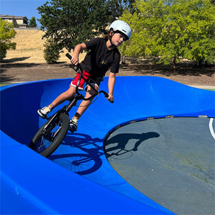 The Plastic modular pump track layout Nova Trek has a large area in the middle that can be used however you’d like.