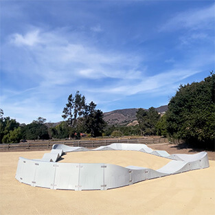 The Plastic modular pump track layout Stellar is a track with a large interior space that is suitable for children.