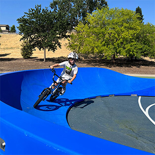 The Plastic modular pump track layout Vortex is perfect for endurance and skill.