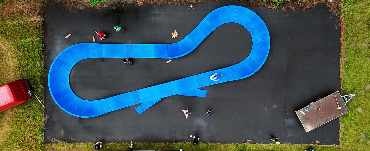 Pump tracks are a cool add-on to school grounds or sports areas